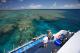 Snorkeller from back of vessel
 - Day Cruise to Great Barrier Reef - Snorkeller w/ Transfers Calypso Snorkel and Dive