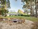 Fire pit and rolling grassy areas - Chambre Estate