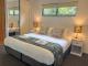 King bed in deluxe villa - MCY Sunshine Coast Airport to Tranquil Getaway on Obi Maleny Tranquil Getaways on Obi Maleny