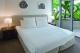 Poolside Penthouse master - Vision Apartments Esplanade Cairns